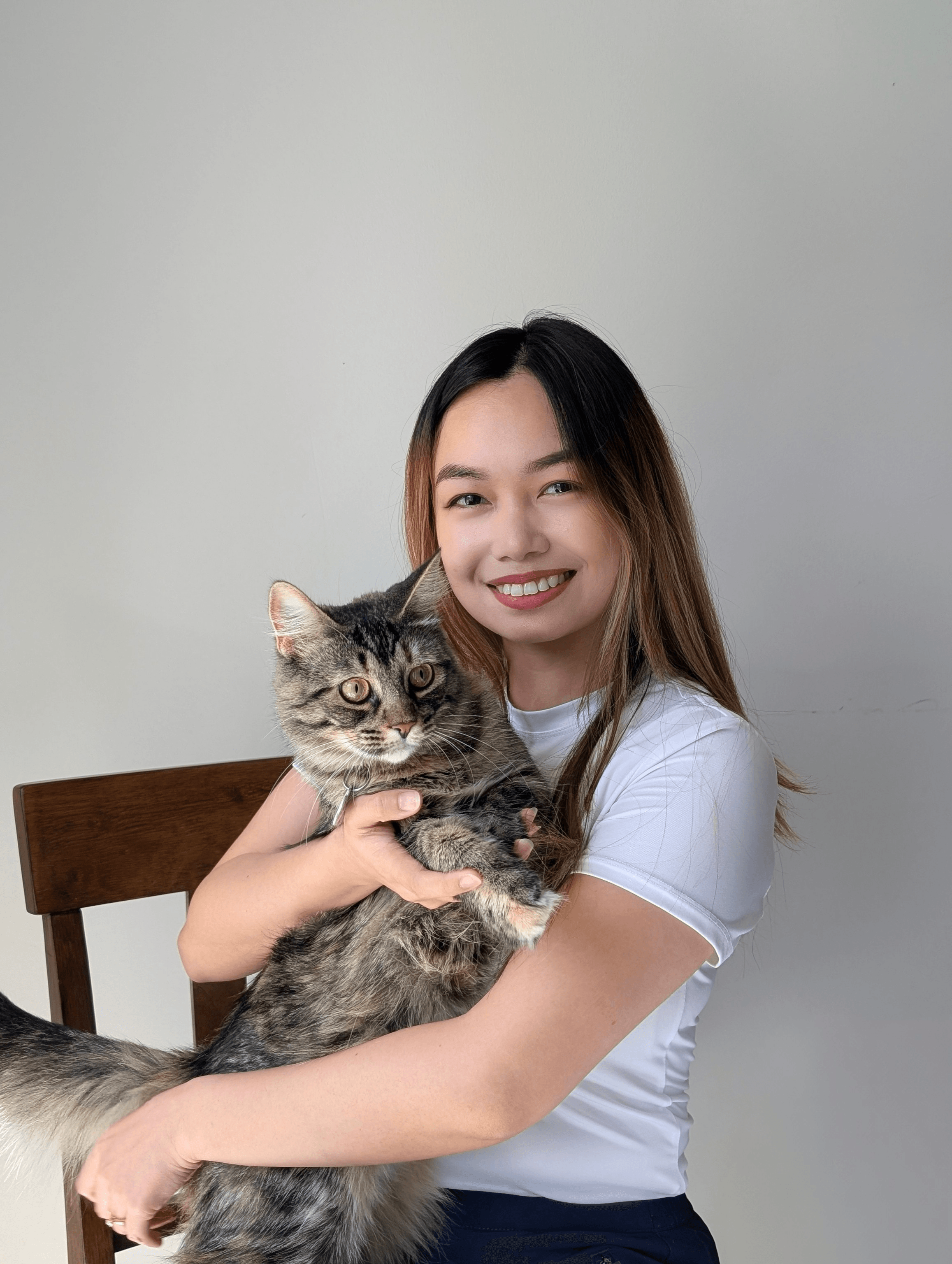 Miju holding her cat